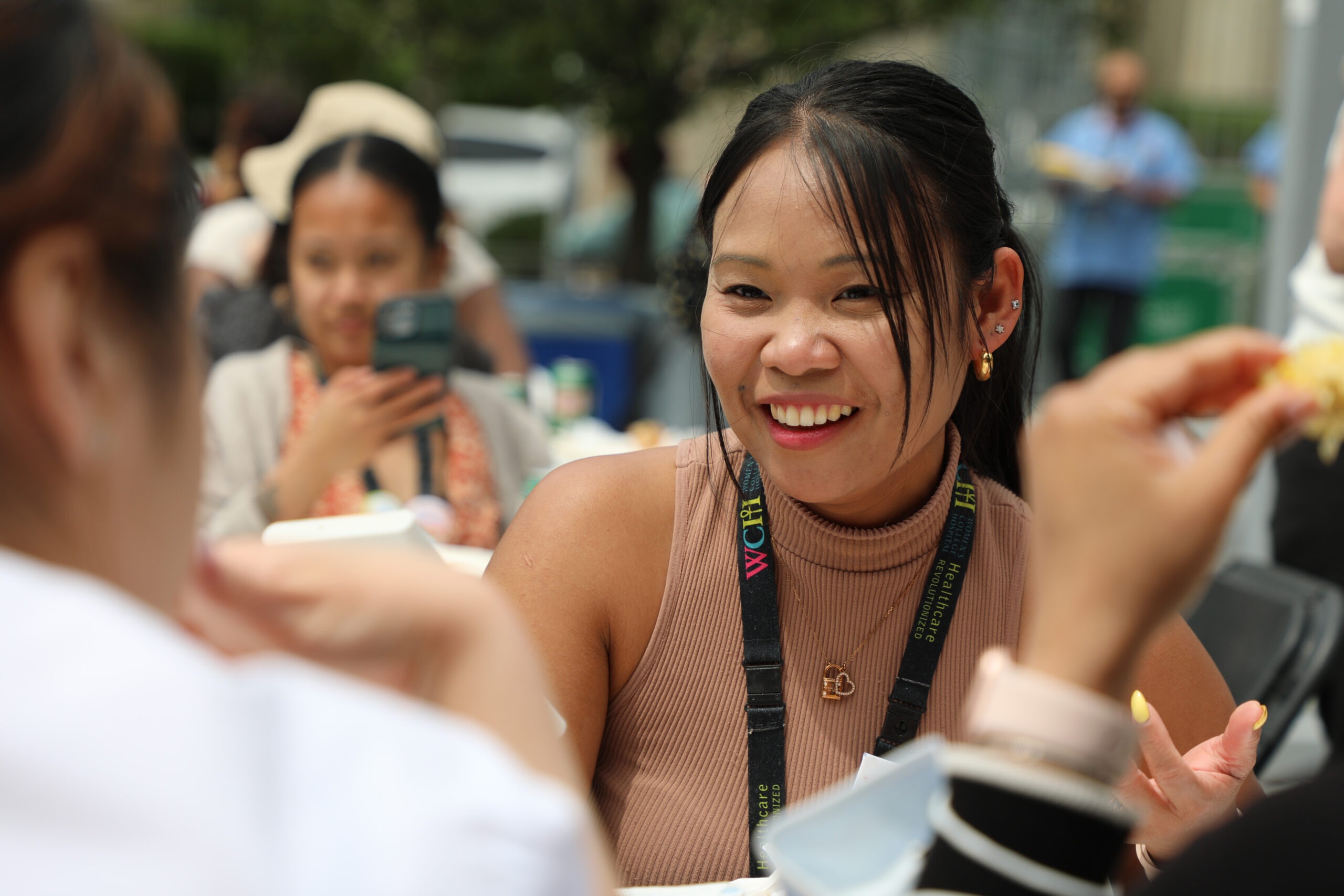 Women's College Hospital staff bbq - photo of asian woman smiling 